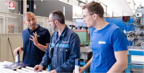 Factory workers talking